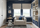 Cozy Kid's Room with Blue Accent Wall and Plush Toys