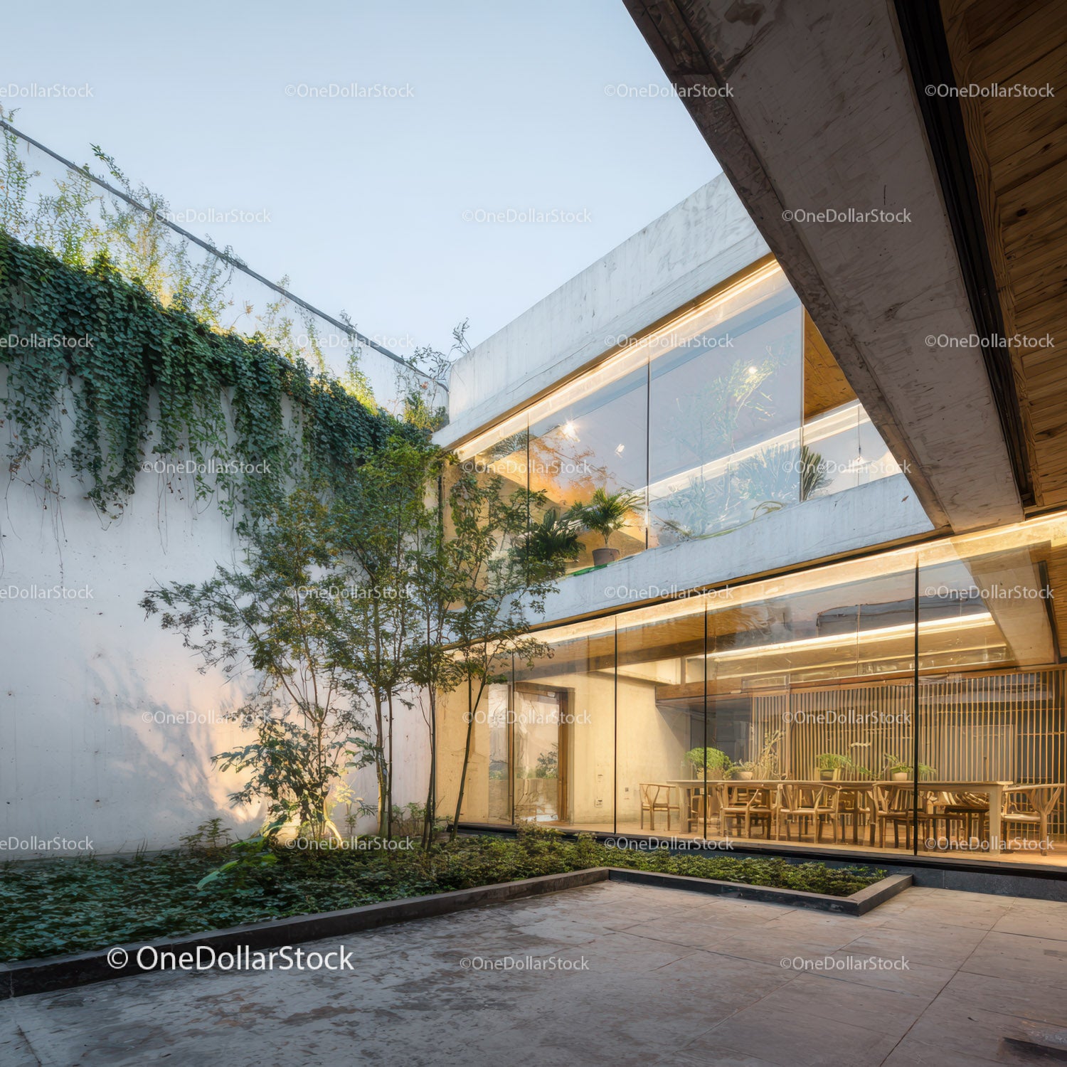 Modern Office Building with Glass Walls and Indoor Garden