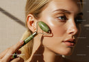 Close-up of Woman Using Jade Roller for Facial Rejuvenation and Skin Care