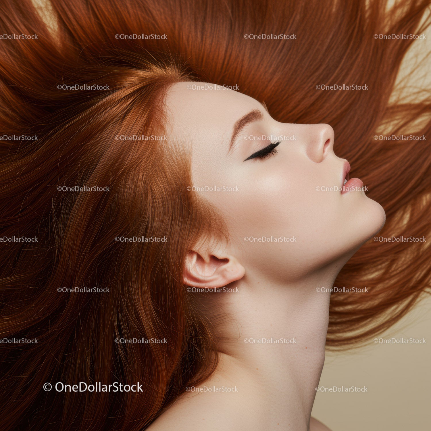 Profile of serene woman with flowing red hair