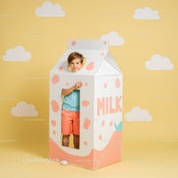 Smiling child inside playful milk carton costume