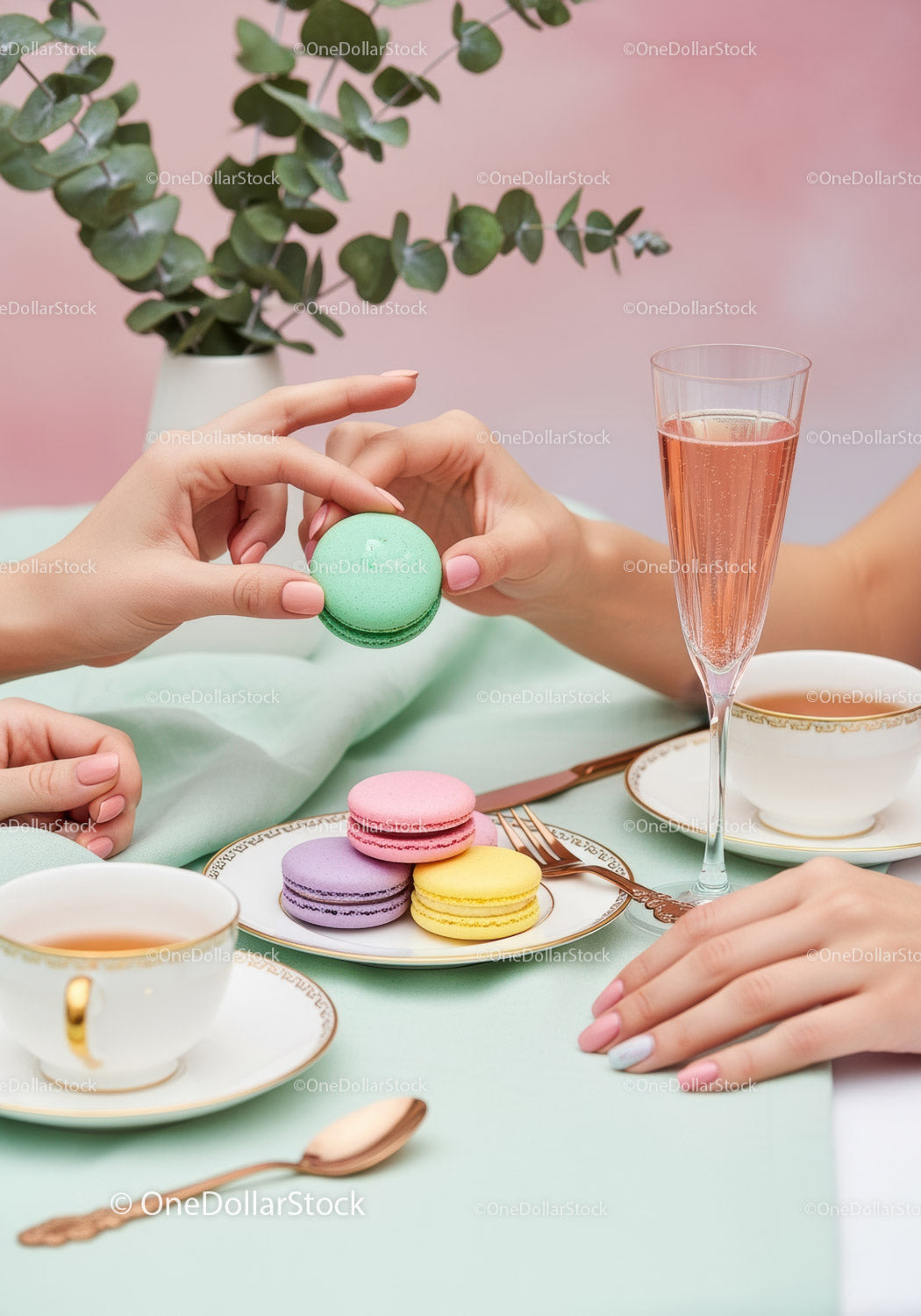 Elegant Pastel Macarons and Tea Set Scene with Champagne