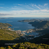 Scenic Coastal Bay with Hills and Small Islands