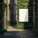 Blank poster on ivy-covered wall in urban alleyway