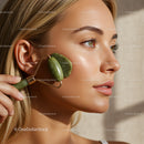 Woman Using Jade Roller for Facial Skincare Treatment