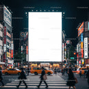 Nighttime city crosswalk with busy urban billboard