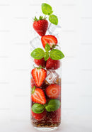 Refreshing sparkling water with strawberries and basil