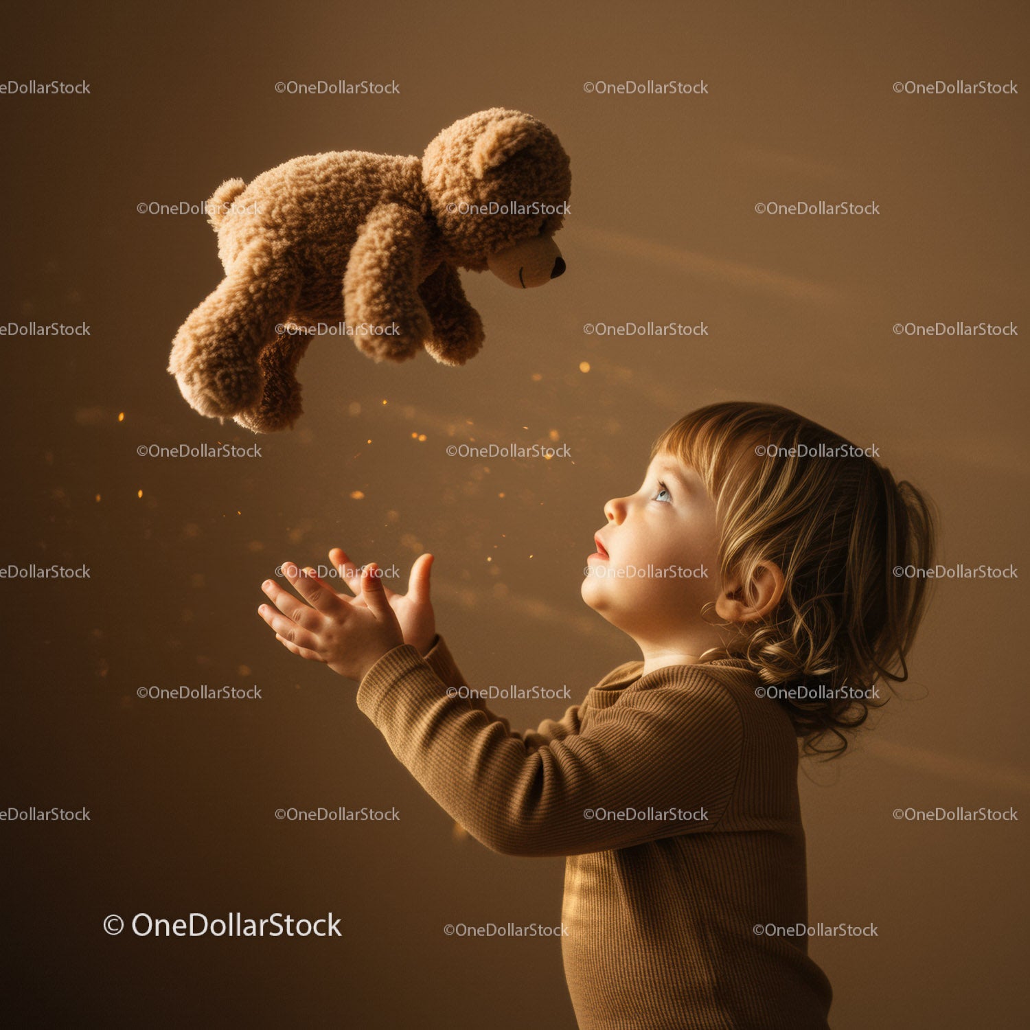 Toddler Reaching for Floating Teddy Bear with Wonder