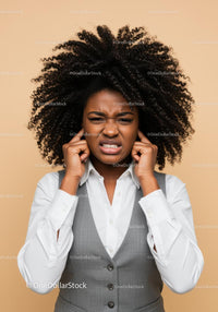 Frustrated Woman Covering Ears with Annoyed Expression