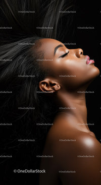 Profile of serene woman with flowing hair and closed eyes