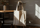 Natural canvas tote bag hanging on chair in cozy room