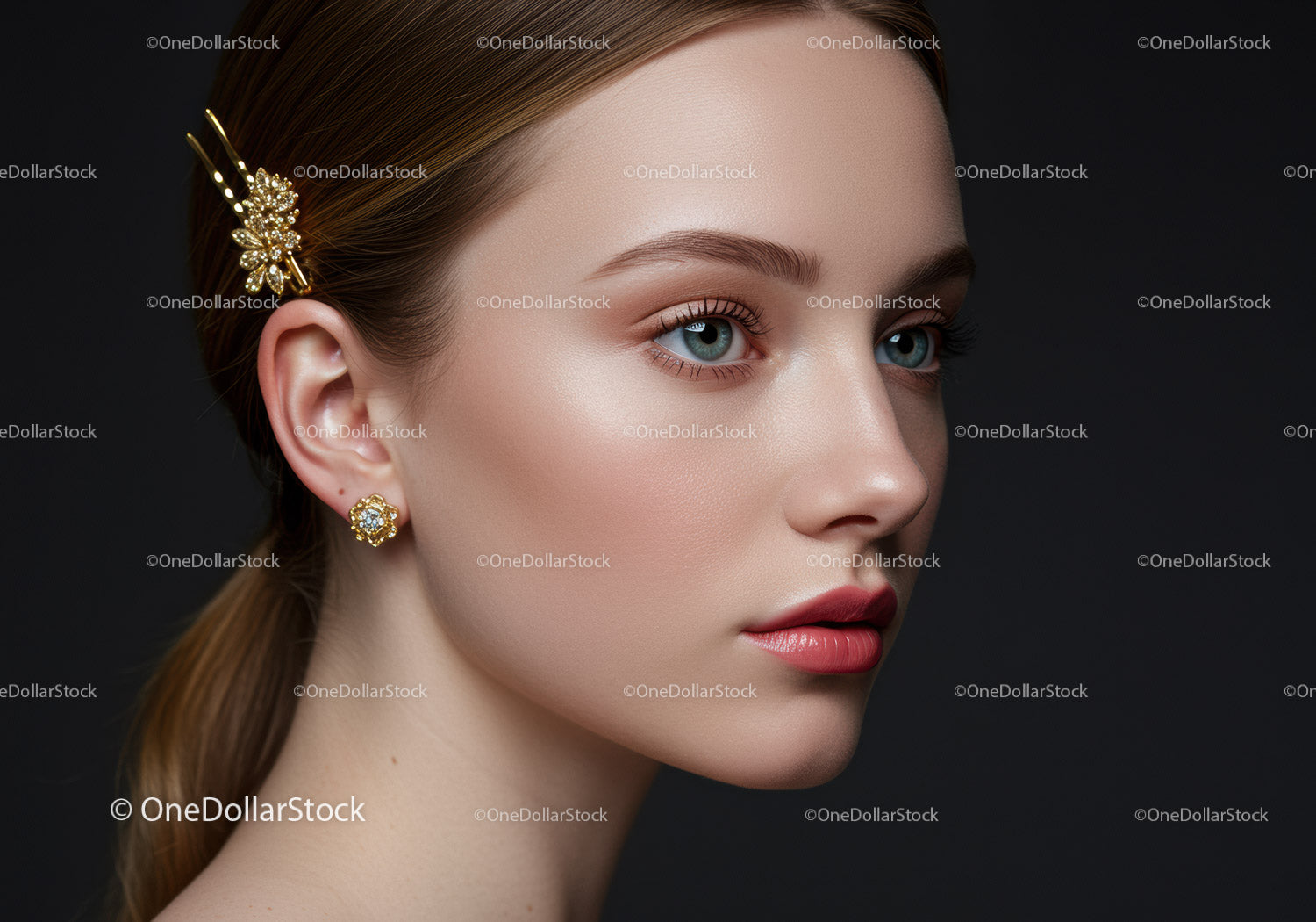 Elegant Woman with Gold Hair Accessory and Pearl Earrings