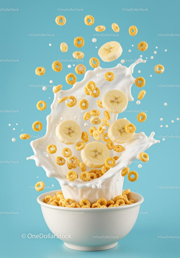 Corn Cereal and Banana Slices Splashing in Milk Bowl JPG Mockup Image
