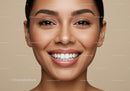 Closeup of cheerful woman with radiant smile and flawless skin
