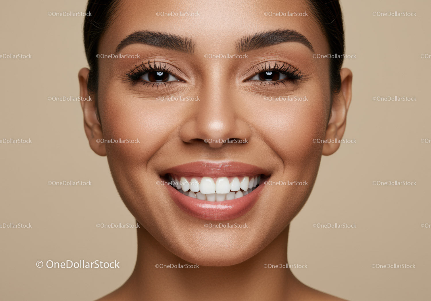 Closeup of cheerful woman with radiant smile and flawless skin