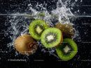 Fresh Kiwi Slices Splashing in Water with Vibrant Splash Effect