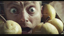 Surprised Man with Wide Eyes Among Green Pears in Close-Up