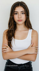 Portrait of a Confident Young Woman with Brown Hair in Casual Style