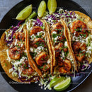 Grilled Shrimp Tacos with Coleslaw and Lime Garnish
