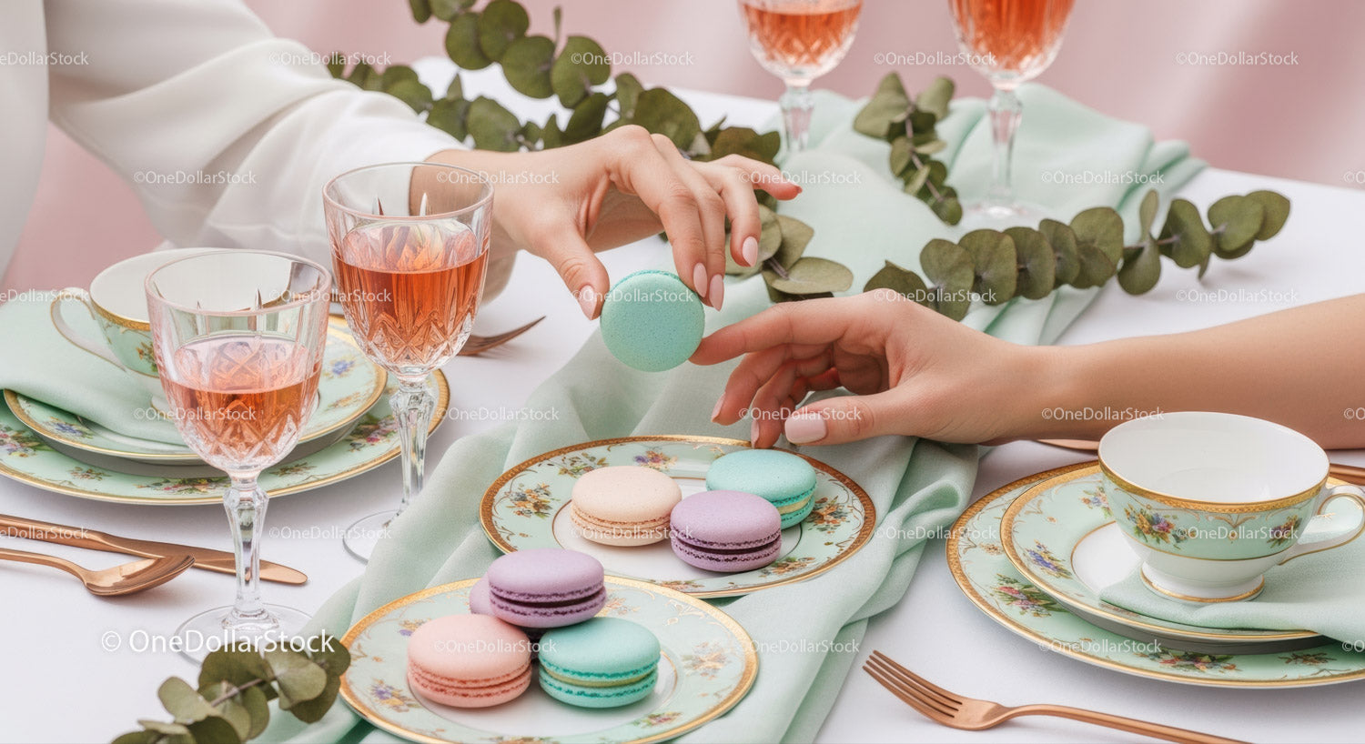 Elegant Pastel Macarons Tea Party Setting with Floral Decor