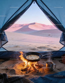 Camping breakfast with flatbread and hot tea in desert