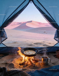 Camping breakfast with flatbread and hot tea in desert