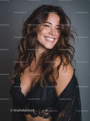 Joyful Woman with Curly Hair and Bright Smile
