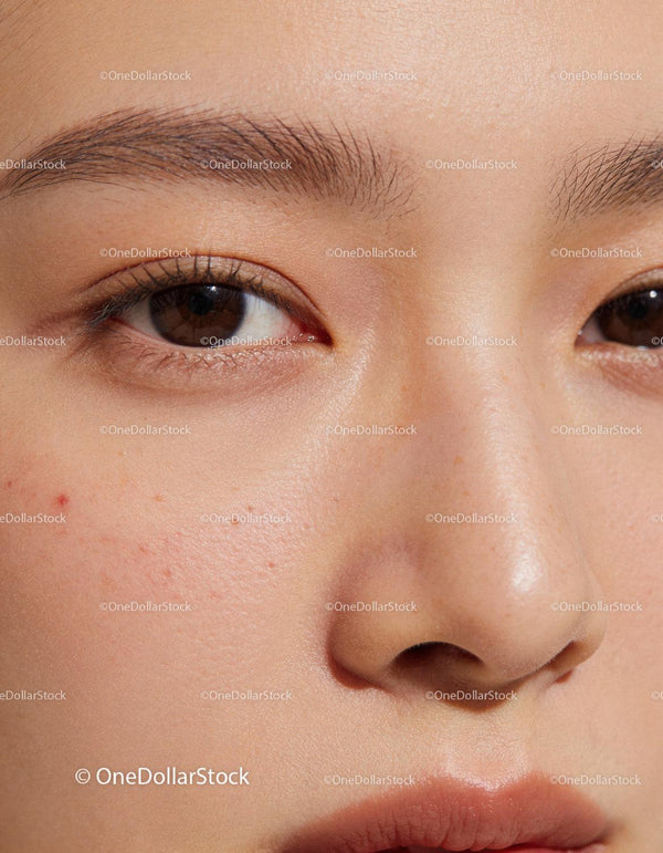 Close up of a young woman with natural skin texture