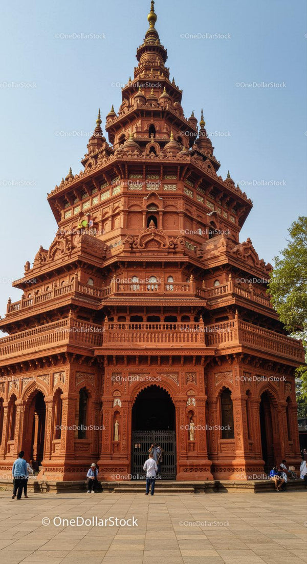 Red Brick Temple with Intricate Carvings and Spires in Historic Indian Style