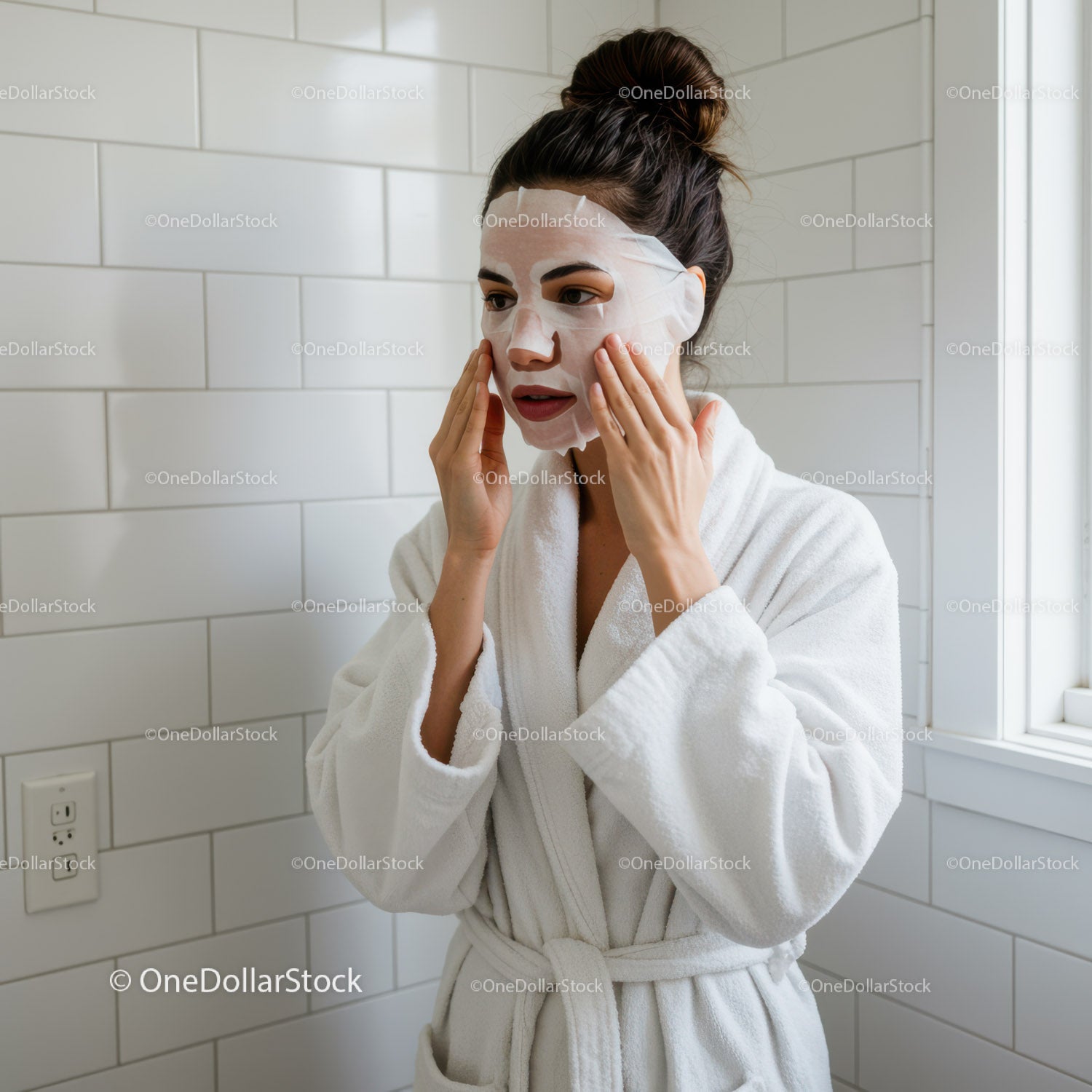 Woman Applying Facial Mask in Bathroom for Skincare Routine