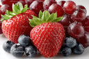 Close-up of Juicy Strawberries and Blueberries with Water Droplets