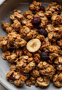 Close up of crunchy granola clusters with dried fruits