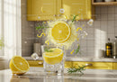 Fresh lemon with ice splashing into a glass in kitchen