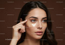 Beautiful Woman Applying Under-Eye Patches for Skincare Rejuvenation