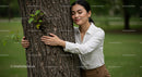 Joyful Woman Relaxing Outdoors in Natural Light