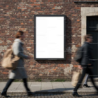 People Walking Past Blank Advertising Board on Brick Wall