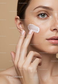Close-Up of Woman Applying Moisturizer for Glowing Skin