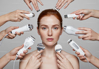 Women Receiving Facial Skincare Treatment with Multiple Devices in Studio
