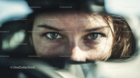 Close-Up of Woman with Green Eyes and Freckles in Natural Light