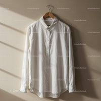 Classic White Shirt Hanging on Wooden Hanger