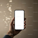 Hand Holding Smartphone with Blank White Screen