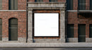 Blank square billboard on brick urban building facade