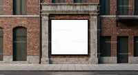 Blank square billboard on brick urban building facade