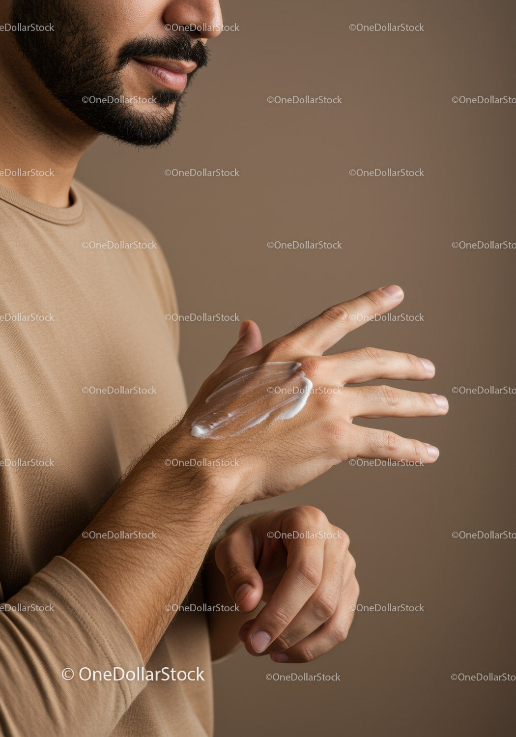 Close-Up of Man Applying Moisturizer for Healthy Skin and Grooming