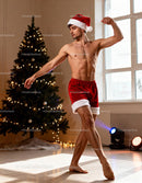Male Dancer in Santa Shorts Performing Holiday Ballet