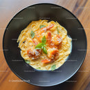Seafood Pasta with Shrimp and Basil Garnish in a Black Bowl