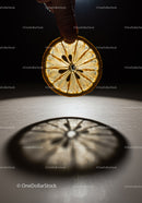 Hand Holding Dried Citrus Slice with Shadow Reflection