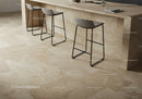 Elegant Beige Kitchen with Modern Bar Stools and Cozy Atmosphere