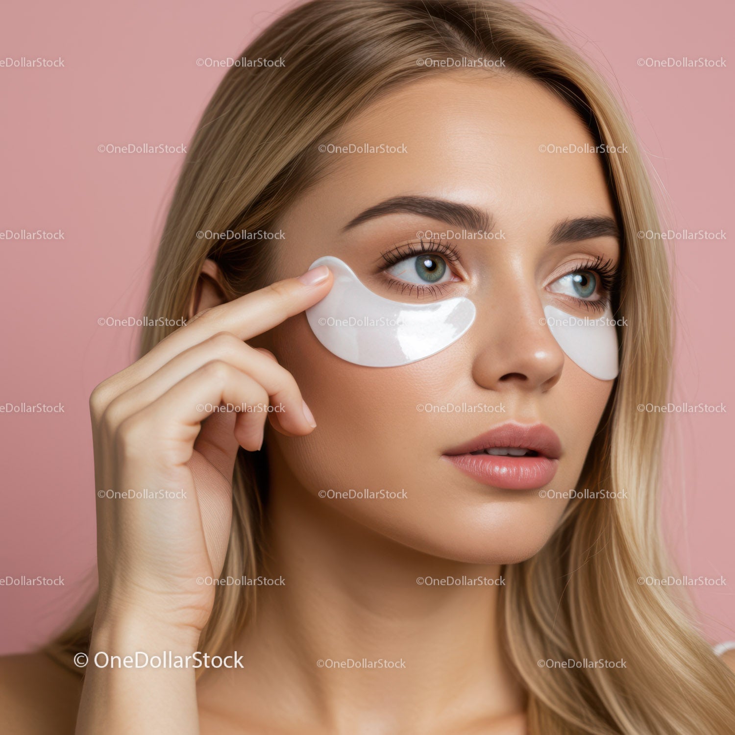 Young Woman Applying Eye Patches for Skin Rejuvenation Effect