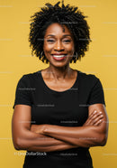 Confident African American Woman with Natural Afro Hair in Studio Portrait